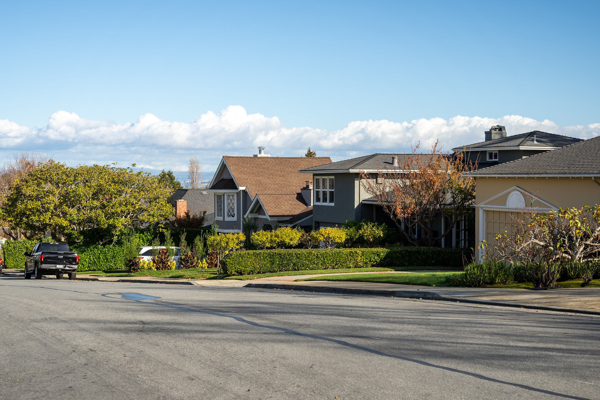 Baywood Knolls neighborhood view and clouds on the horizon in San Mateo.