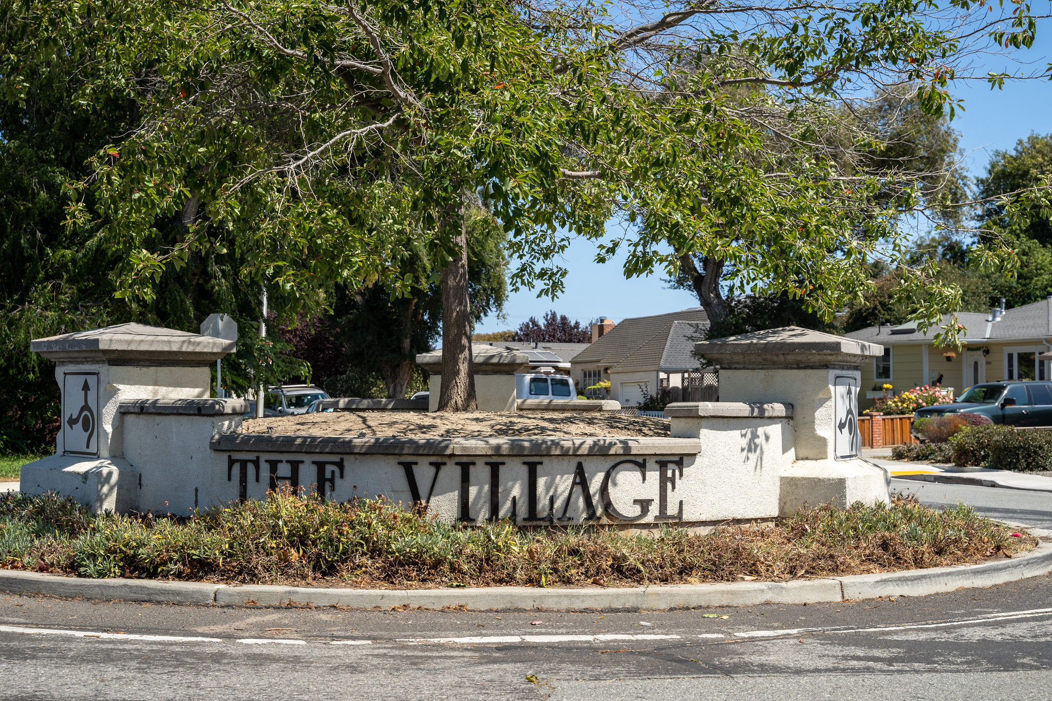 Welcoming sign at the entrance of The Village area in San Mateo