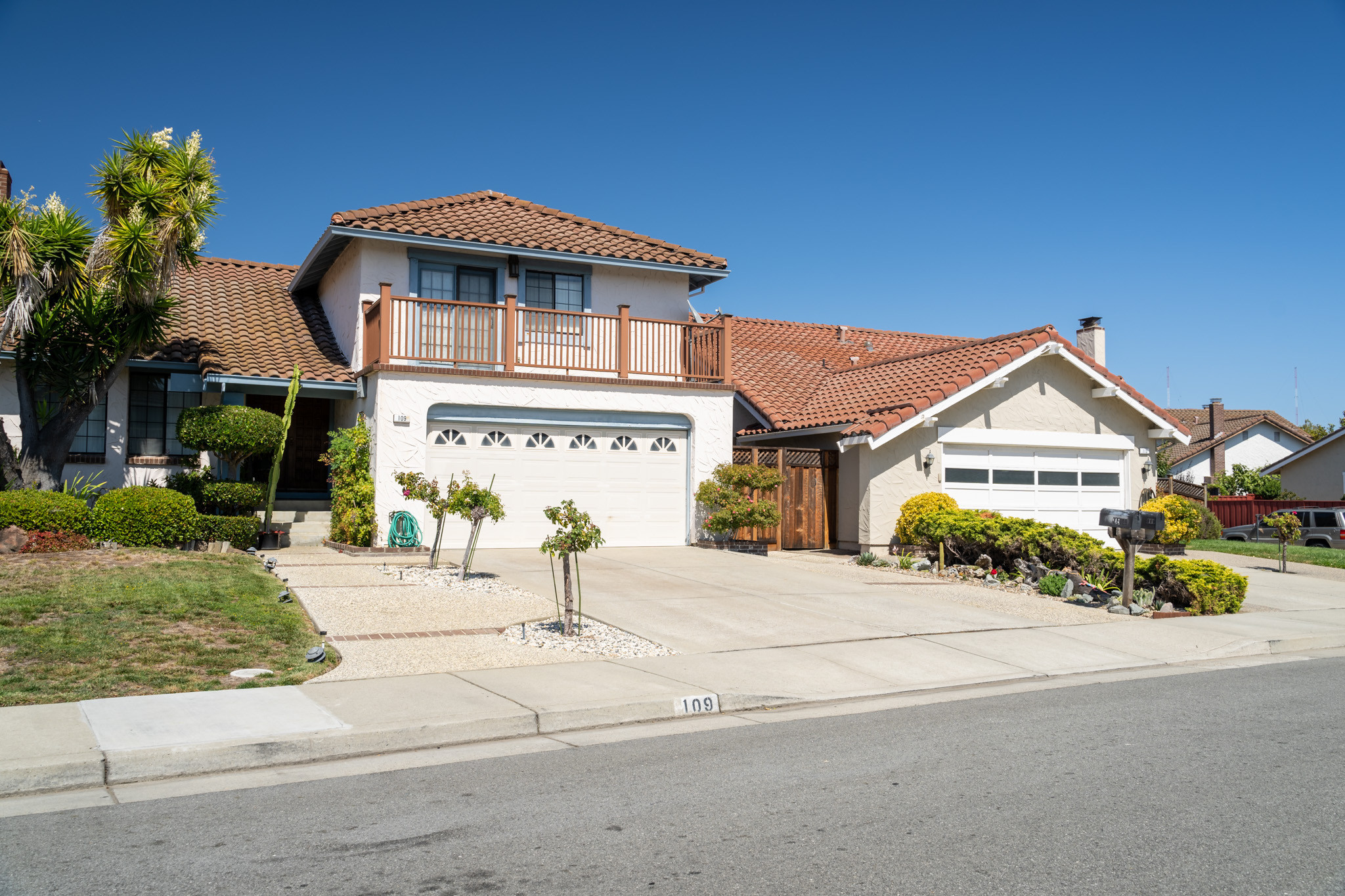 Home with spanish tile roof top in the Lauridale area in San Mateo