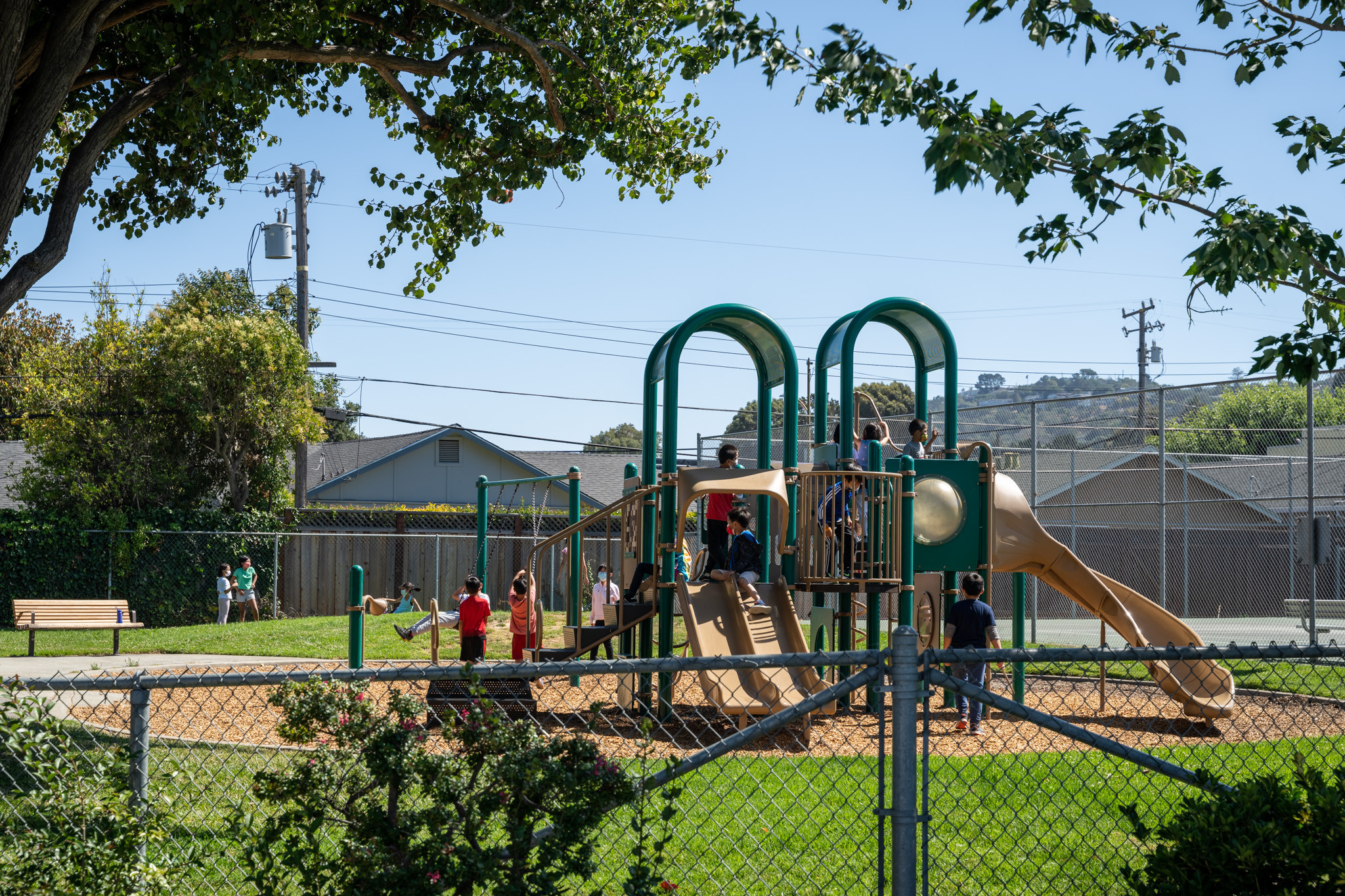 Children playing on play structure in the Lauridale area in San Mateo