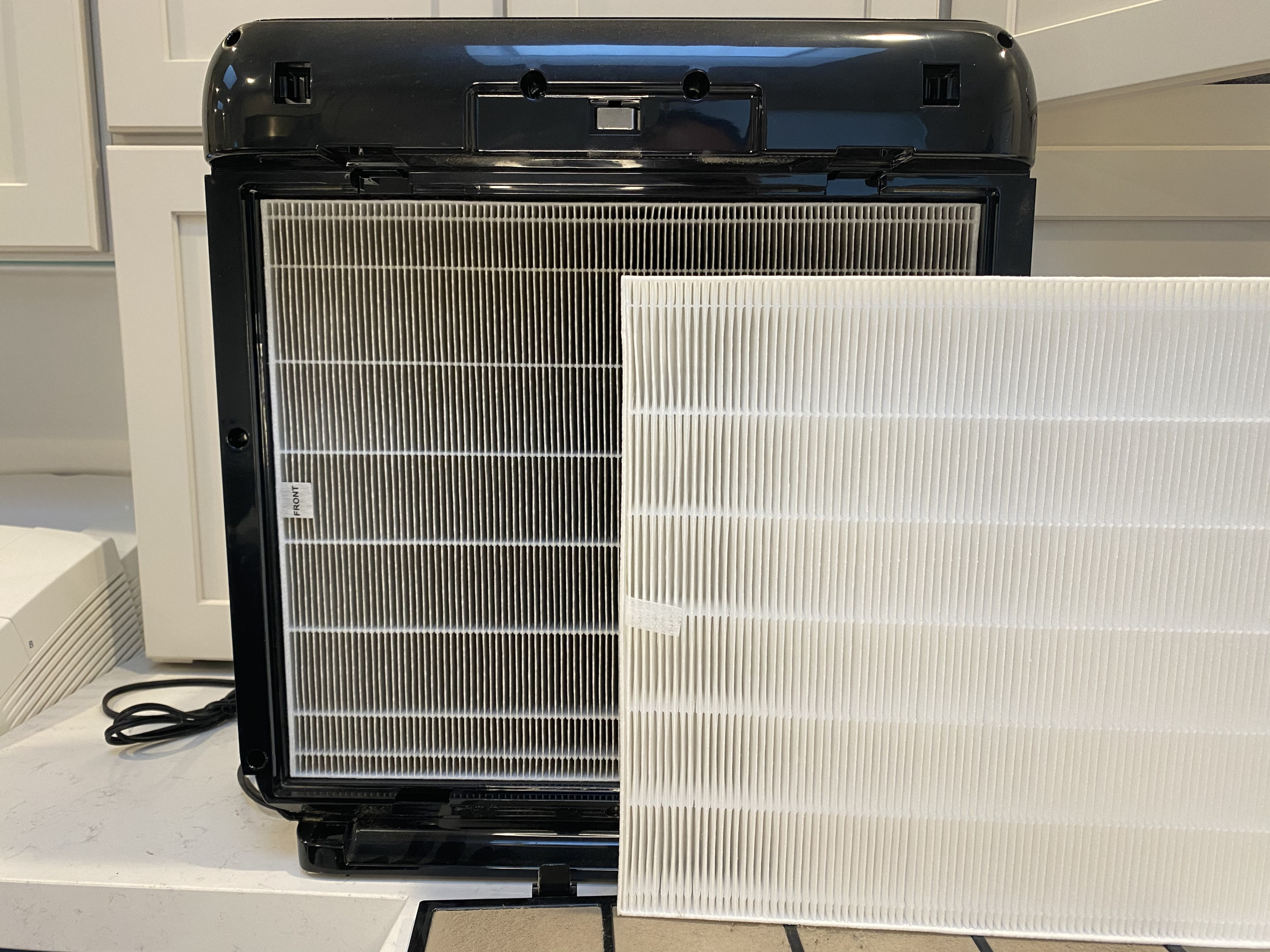 Our Coway unit HEPA filter before and after.
