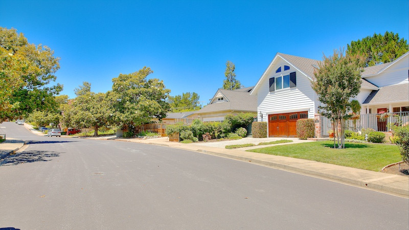 White craftsman home with wood garage in the Farm Hill Estates area in Redwood City