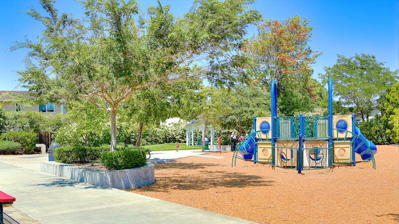 Playground with blue slide in Sea Colony.