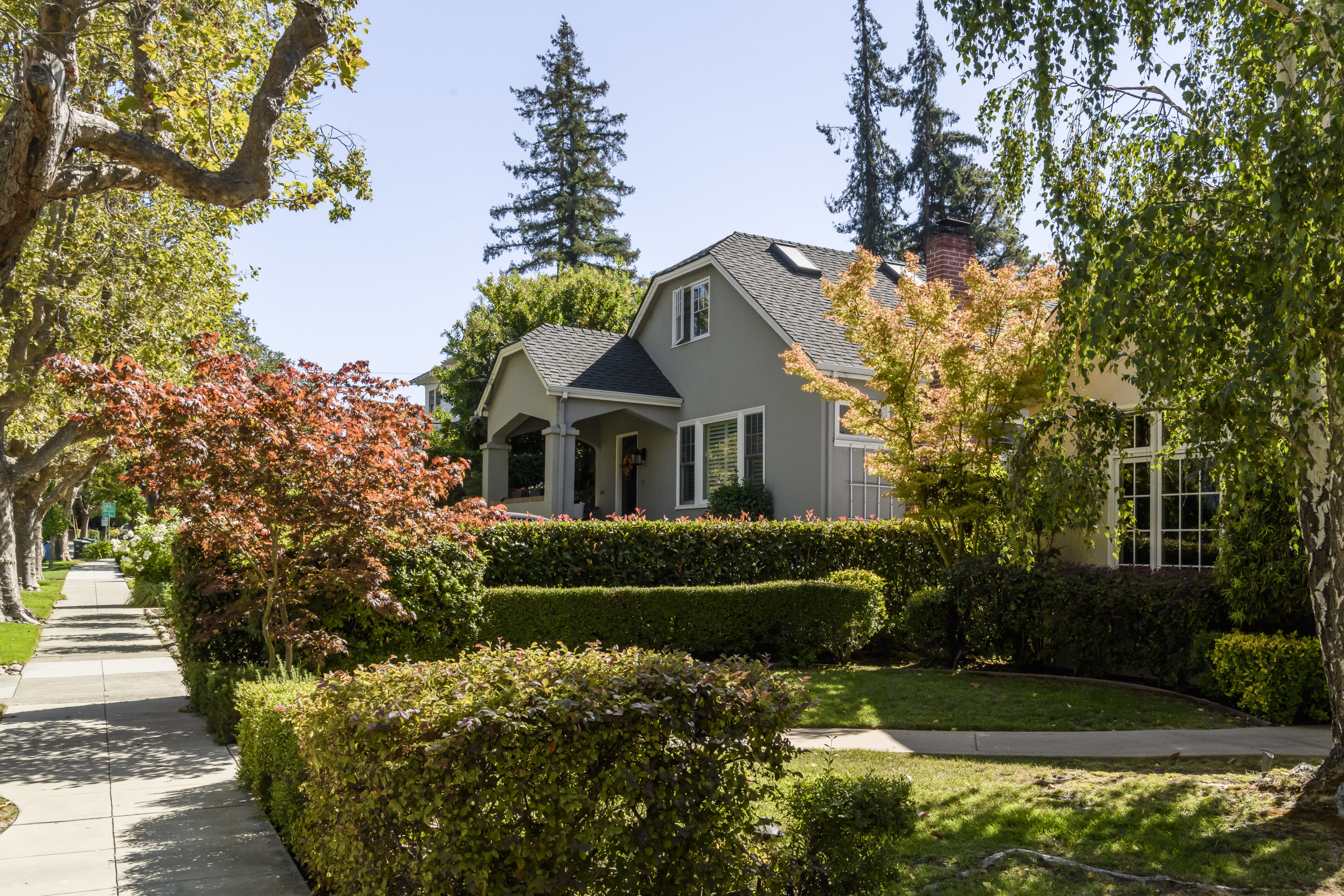 Burlingame Park home with tile roofing and grey exterior finish in Burlingame.